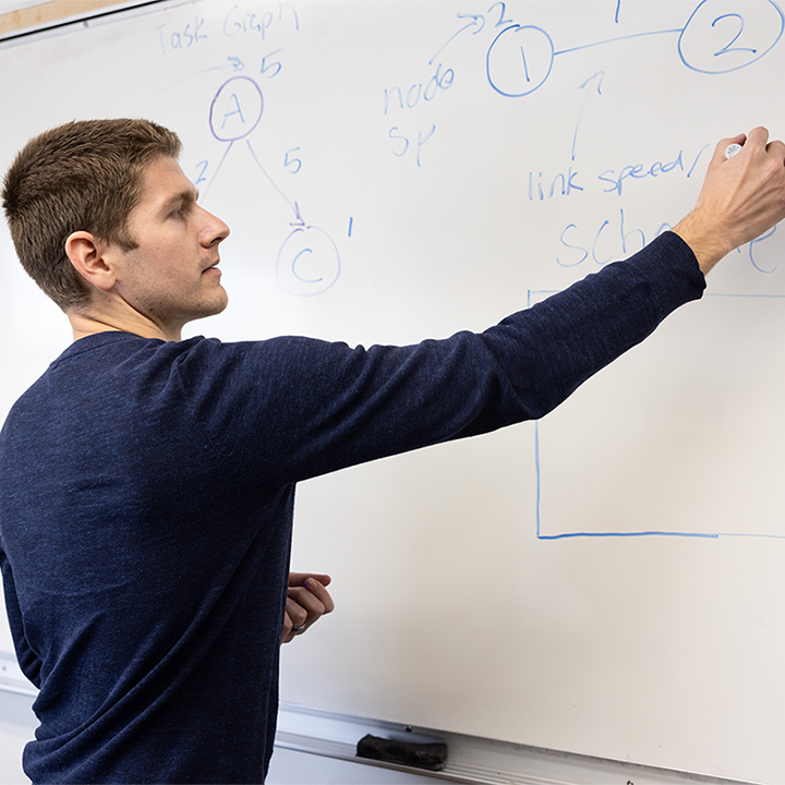 Jared Coleman teaching computer science at LMU